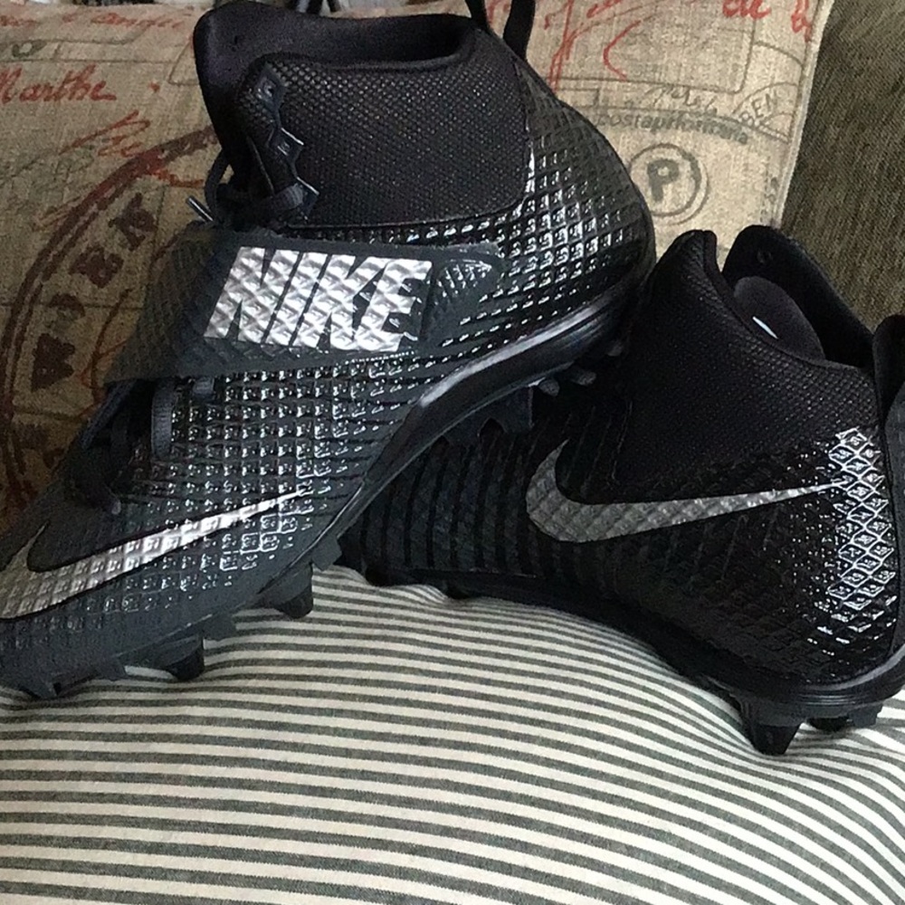 Never worn Nike football cleats